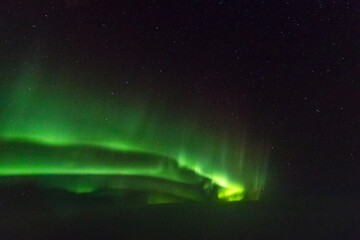 Northern Lights, Aurora Borealis seen from the cockpit above the Atlantic Ocean