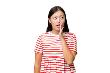 Young Asian woman over isolated background showing ok sign with fingers