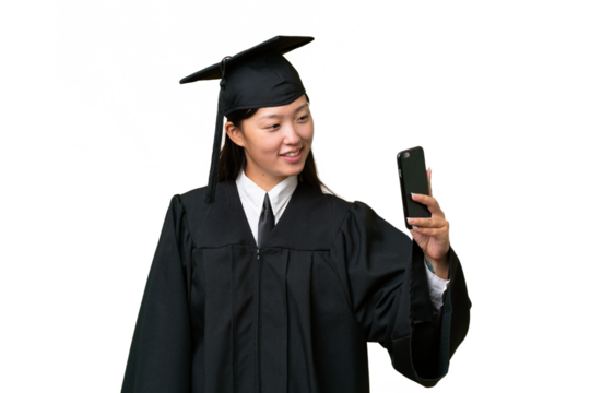 Young university graduate Asian woman over isolated background making a selfie - Powered by Adobe
