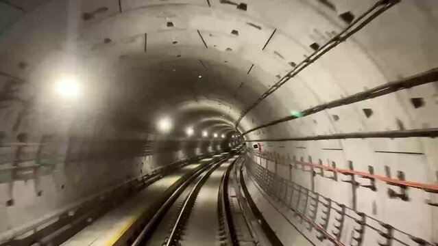 Hyperlapse of train in a subway rear view. Singapore MRT train in a subway rear view