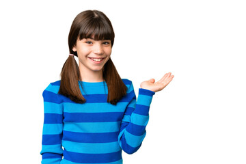 Little caucasian girl over isolated background holding copyspace imaginary on the palm to insert an...