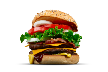 Homemade Double cheese bacon burger with lettuce, onion and tomato isolated on transparent background