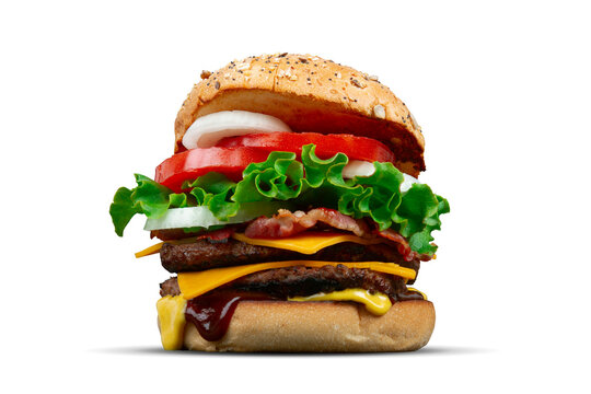 Homemade Double cheese bacon burger with lettuce, onion and tomato isolated on transparent background