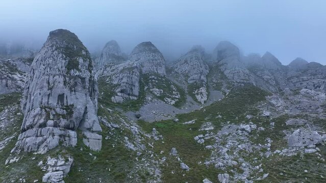 Landscape of mists and rocks in the Castros de Horneo in the Collados del Ason Natural Park. Soba Valley, Cantabria, Spain, Europe