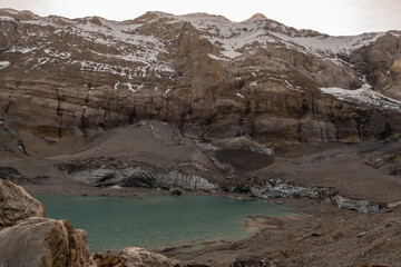 Pretty little lake in the swiss alps at the Klausenpass in Switzerland