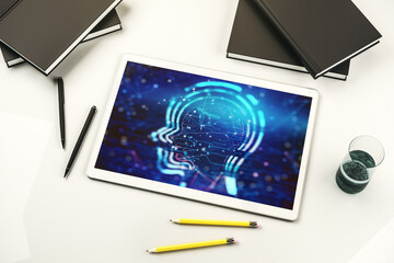 Creative artificial Intelligence concept with human head sketch on modern digital tablet display. Top view. 3D Rendering