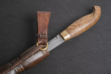 Damascus steel knives on black fpn. Kitchen utensils background with Japanese knife. A set of...