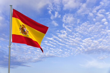 Kingdom of Spain Flags Over Blue Sky Background. 3D Illustration