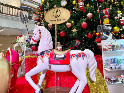 Moscow, Russia, December, 04, 2022. A toy horse in the interior of the central store "Detsky Mir" on Lubyanka during the New Year holidays. Moscow