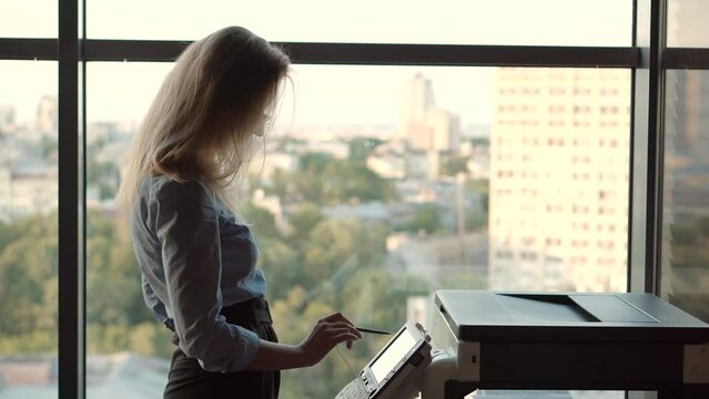 Secretary sending document on email and printing document 