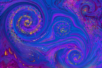 Gold powder on liquid abstract background, psychedelic texture, paint swirls in neon colors.
