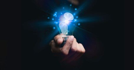 Businessman holding a light bulb, Creative new idea. Innovation, brainstorming, solution and inspiration concepts. imagination, creative thinking problem solving...