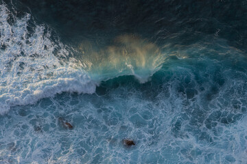 Epic waves in the Atlantic Ocean off the coast of Madeira off Morocco. Great sunset at the sea.