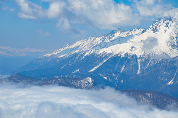 Fototapeta na wymiar Snowy winter landscape of a ski resort,panoramic view