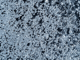 ice texture with bubbles close up in the detail - macro photography