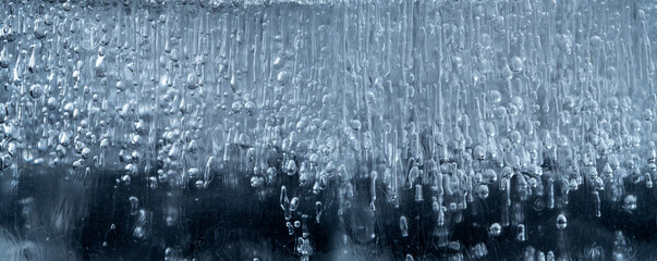 Naklejka na ściany i meble ice texture with bubbles close up in the detail - macro photography