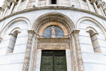 Pisa, Italy - October 24, 2022, The Campo Santo in Pisa with the Cathedral and the Leaning Tower