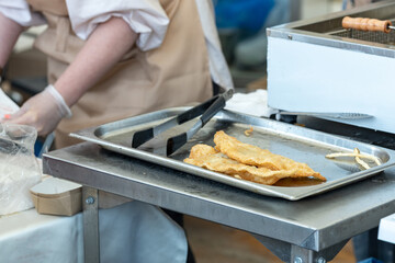 a culinary product made from unleavened dough fried in oil