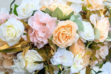 beautiful pastel-colored flowers in a bouquet on a light background