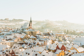 Český Krumlov, UNESCO. Historical town with Castle and Church at sunrise. Beautiful winter...
