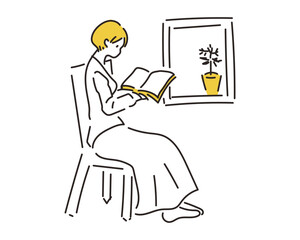 窓辺で読書をする女性