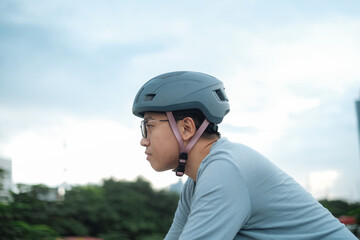 A young leisure cyclist riding his bike.