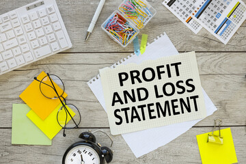 profit and loss statement, text centered top view. calendar, stickers