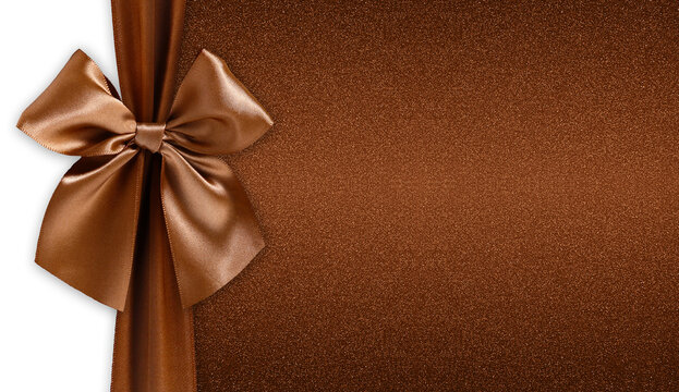 brown ribbon bow isolated on glitter background, top view copy space for gift greeting card, Merry Christmas and happy Easter or father and valentine day banner, template for wrapping chocolates box