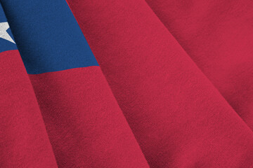 Samoa flag with big folds waving close up under the studio light indoors. The official symbols and...