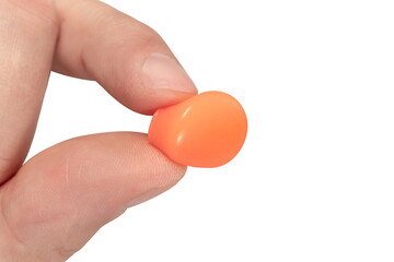 Human silicone earplugs hold fingers on white background