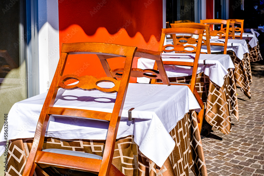 Sticker chairs at a sidewalk cafe