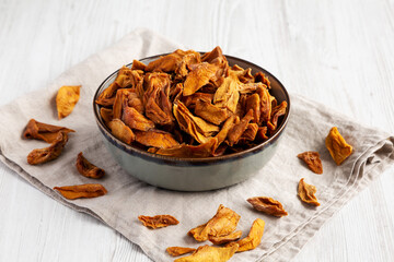 Delicious Organic Dried Mango Fruit in a Bowl, low angle view.