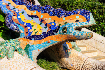 Multicolored mosaic dragon salamander of Gaudi in Park Guell, Barcelona, Spain