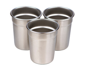 Steel shot glasses isolated on white background. Bar accessories and tools for making cocktail.
