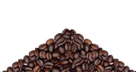 Big pile of roasted coffee beans on white