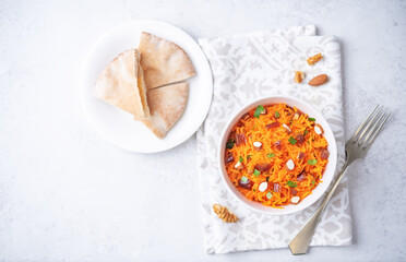 Carrot nuts dated moroccan salad in a bowl