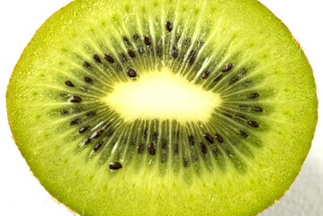 Naklejka na ściany i meble Kiwi fruit sliced macro view