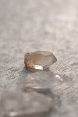 Raw Quartz crystal photographed on stone. 