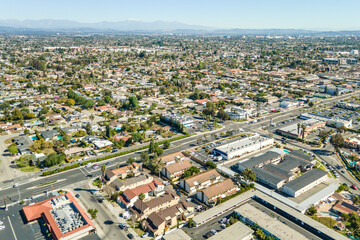 Fototapeta na wymiar Garden Grove, California – March 8, 2022: aerial drone photo toward Garden Grove Blvd and Gilbert St with shops and houses