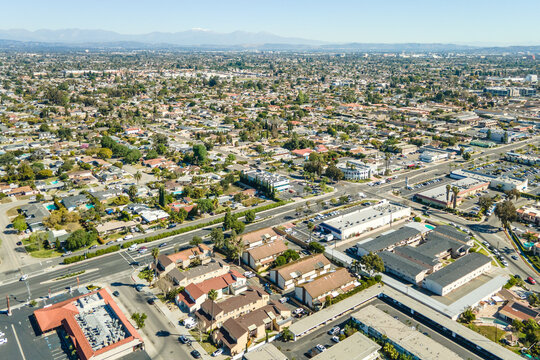 Garden Grove, California – March 8, 2022: aerial drone photo toward Garden Grove Blvd and Gilbert St with shops and houses