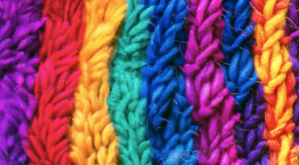 Foto op Aluminium colorful wool texture, closeup of rainbow colored knitted scarf, cozy winter texture, generative AI © Nicoletta