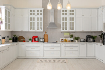 Beautiful kitchen interior with stylish modern furniture