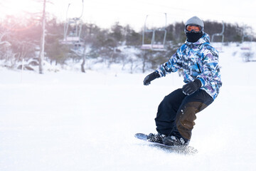 Fototapeta na wymiar Snow leisure, etc. Snowboarders.