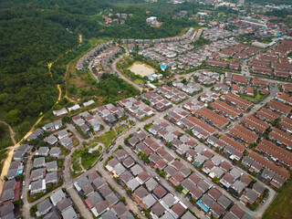 New development real estate. Aerial view of residential houses and driveways neighborhood during a fall sunset or sunrise time.Tightly packed homes.Top down view over private houses in phuket thailand