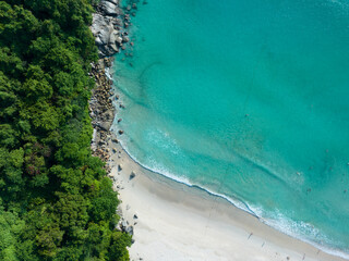 Amazing top view beautiful beach, Aerial view of Tropical beach sea in the beautiful Phuket island, Located at merlin beach Phuket Thailand