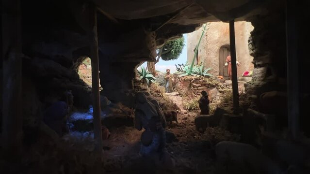 Unusual representation for Christmas decorations with hand-painted nativity figurines. Zoom in