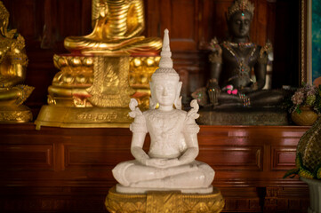 Bangkok, Thailand, August 21, 2022 :  Wat Sangkathan. Seated Buddha image.