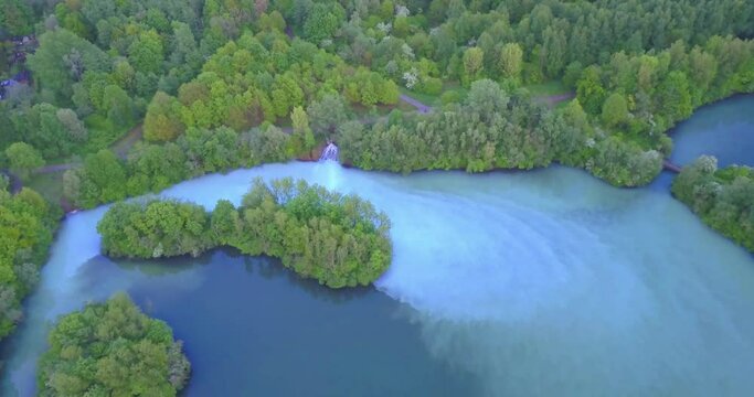 Bochum Werne, Germany. mine water. Lush green forest and turquoise lake waters.
