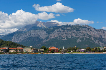 Fototapeta premium View from the sea to the hotels in the Turkish resort town of Kemer on a summer day