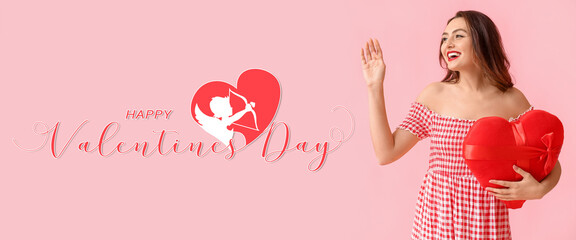 Banner for Valentine's Day with beautiful young woman holding red heart on pink background